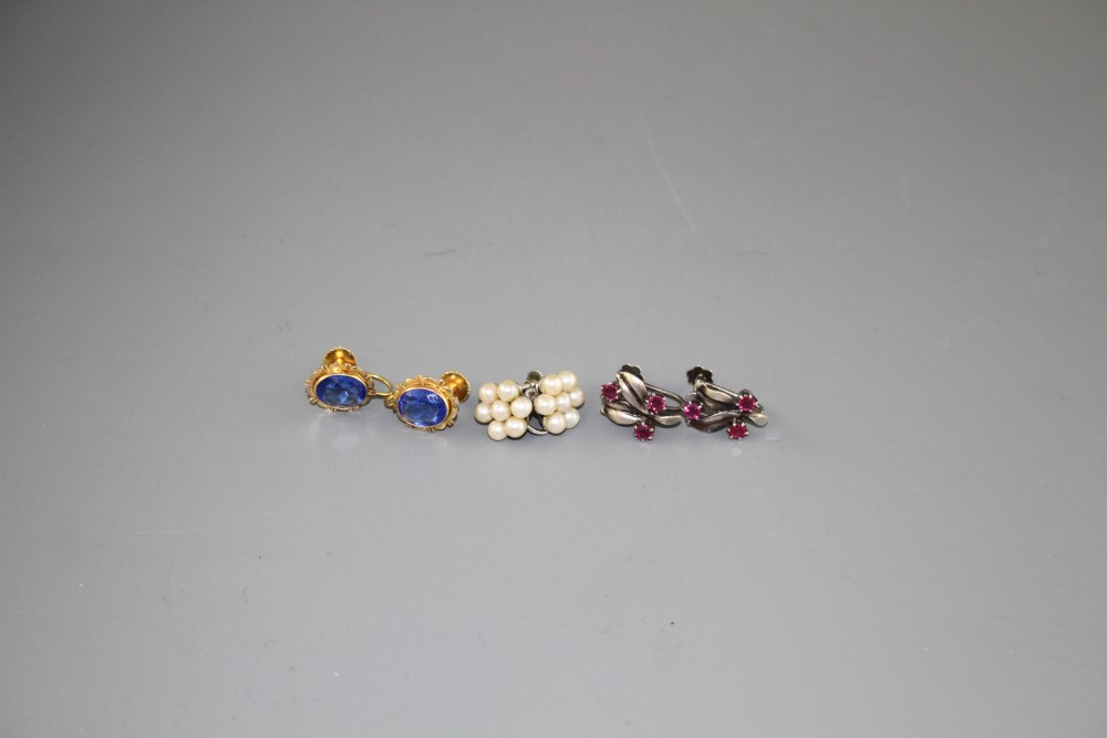 Three assorted pairs of 9ct earclips, one pair set with blue paste, the others in 9ct white metal, cultured pearl